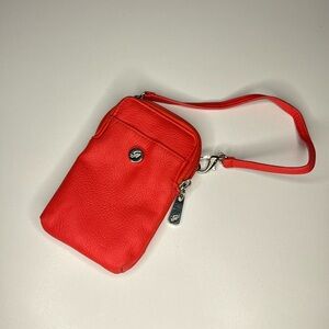 grace adele coral wristlet